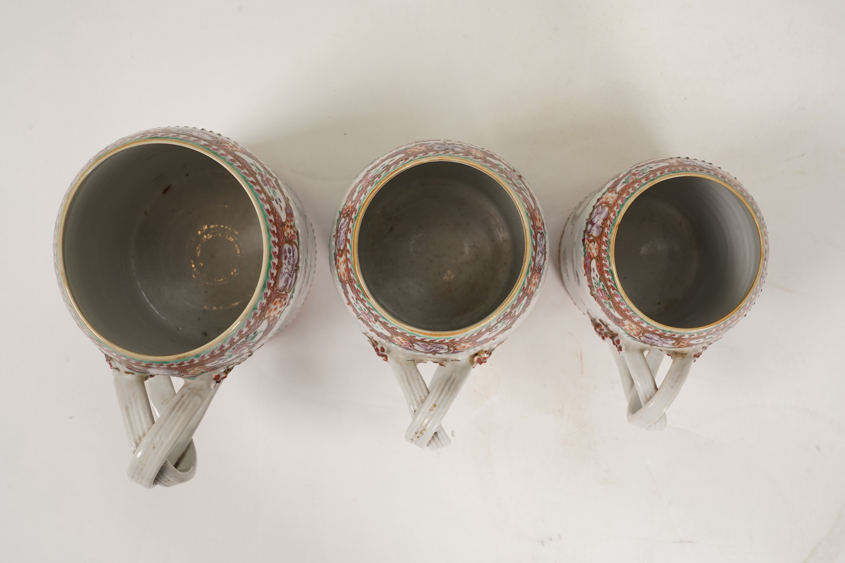 A graduated set of three Chinese export famille rose mugs, Qianlong period